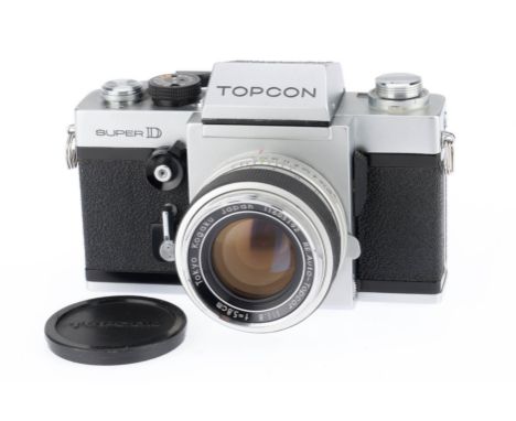 A Topcon Super D 35mm SLR Camera, silver, serial no. 7108615, body VG, light lifting of leatherette to prism housing, shutter