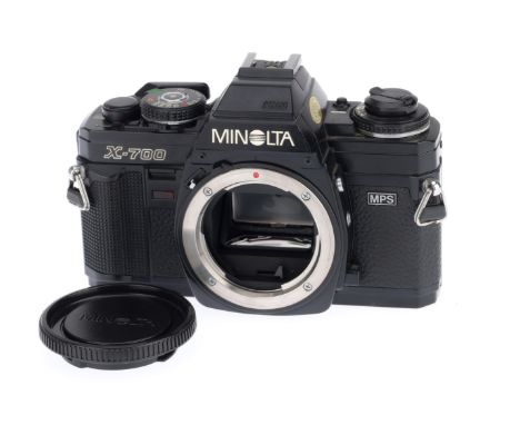 A Minolta X-700 35mm SLR Camera Body, black, serial number 2822673, body G-VG, with batteries inserted the shutter does not f