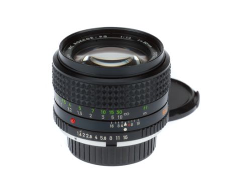 A Minolta MC Rokkor-PG f/1.4 50mm Lens, black, serial number 3379365, barrel G-VG, optics G, light fungus spots near rear ele