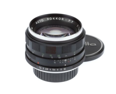A Minolta Auto Rokkor-PF f/1.4 58mm Lens, black, serial number 1270354, barrel G-VG, optics G, light dust, with caps.