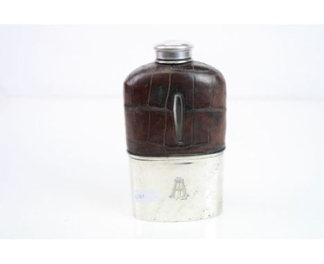 Victorian silver and crocodile leather mounted glass hip flask, the silver screw cap and removable cup with engraved initials