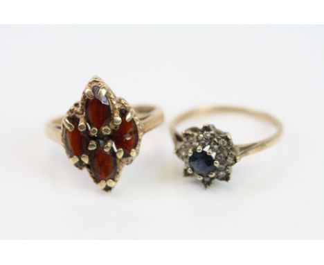 Garnet 9ct yellow gold dress ring, ring size L together with a sapphire and diamond flower head ring, small round mixed cut s