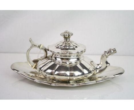 White metal teapot and stand, squat melon shaped teapot, height approx 11cm, marquised shaped fluted stand, length approx 25c