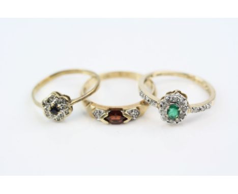 Emerald and diamond 9ct yellow gold cluster ring, small oval mixed cut emerald, four claw setting, ten small round eight cut 