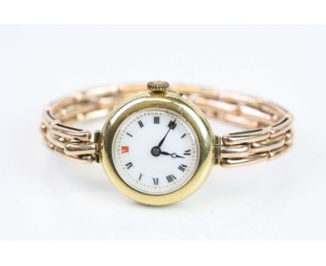Late Victorian 18ct yellow gold cased wristwatch, 18 jewels, case hallmarked London 1899, white enamel dial, black and red Ar