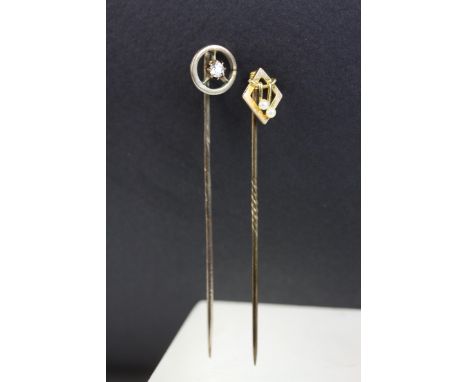 Diamond yellow metal stick pin, the round old cut diamond weighing approx 0.10 carat; together with an Edwardian seed pearl 1