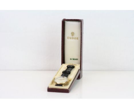 A vintage gents Tudor Royal wrist watch with 9ct gold 30mm case.  Manual wind, working at time of report. Replacement strap. 
