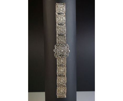 Edwardian Art Nouveau silver belt formed of eighteen pierced panels, stylised shell and scroll design, with larger matching b