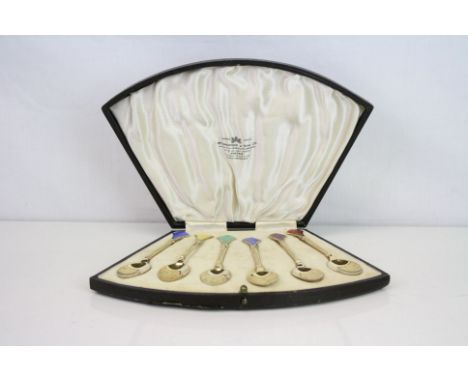 Set of six Art Deco enamelled silver gilt coffee spoons, Birmingham 1932, fan-shaped enamelled terminals, faceted stem with b