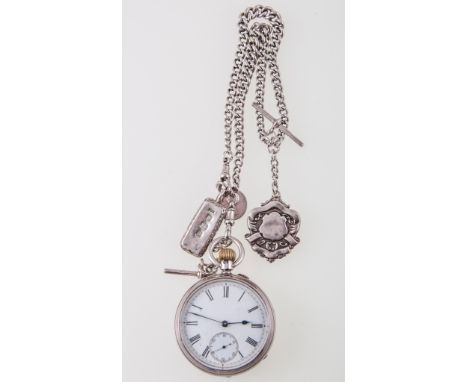 A silver open face pocket watch, white enamel dial with a Roman numeral chapter ring with subsidiary seconds dial, silver out