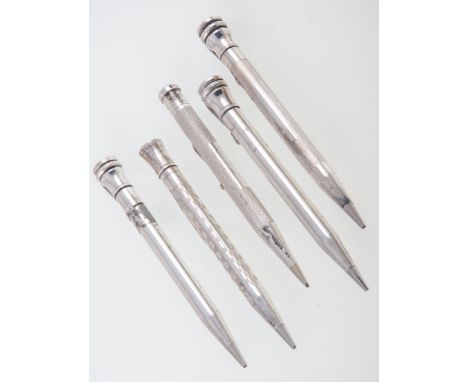 Five silver Eversharp pencils, various engine turned barrels, 10cm long, circa 1950's, not boxed.Footnote: These are original