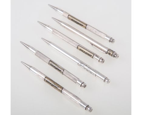 Six silver Eversharp pencils, various engine turned and plain barrels, 13cm long, circa 1950's, not boxed.Footnote: These are