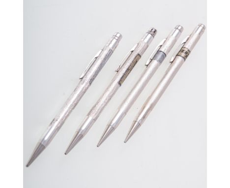 Four silver Eversharp pencils, engine turned barrels, 13cm long, circa 1950's, not boxed.Footnote: These are original samples
