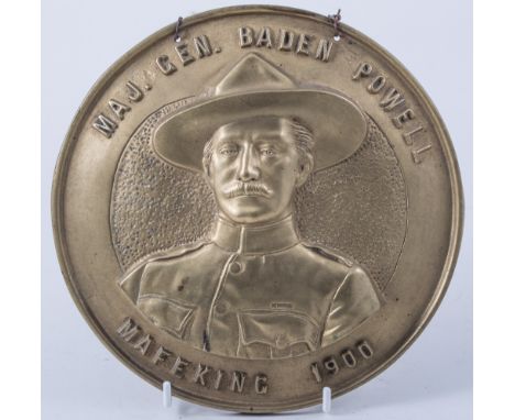 A cast brass circular plaque, Maj. Gen. Baden Powell Mafeking 1900, diameter 20cms, a part M6 periscope, tank models and othe