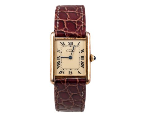 Le Must De Cartier - A lady's  silver gilt Vermeil Tank Quartz wristwatch, having a rectangular champagne dial with Roman num