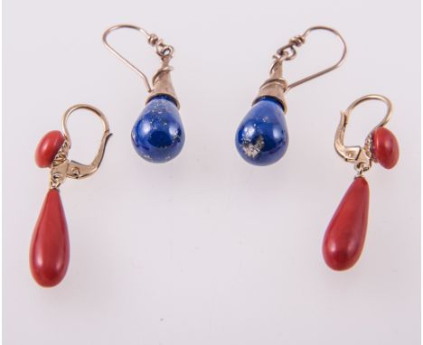 Two pairs of earrings, a pair of coral torpedo shaped 35mm drops with coral button stud to top, pierced hook fittings with sa