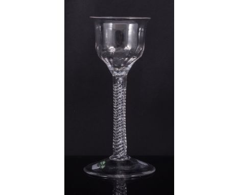 Flared lip ogee bowl wine glass, mid 18th century, the bowl with light spiral moulding, double-series opaque twist stem, 15cm