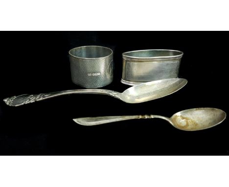Two silver napkin rings, one inscribed 'John', each with engine turned design, Sheffield 1924, makers mark HA for Atkin Broth