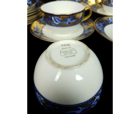Shelley China - A part tea service of Blue Swallows pattern, Number C 8190, comprising: four cups, five saucers, six plates a