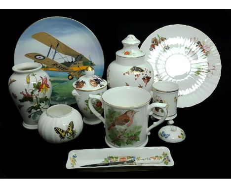 A Coalport Tiger Moth Limited Edition plate; A Royal Worcester Christmas loving cup; a Royal Worcester Butterflies pattern sp