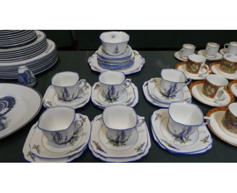 A Collection of Standard China Tudor Shape Teawares Comprising Six Trios, Cake Plate, Sugar Bowl and Five Side Plates and Two