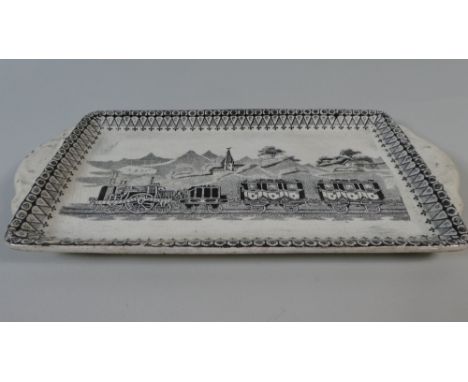 A Ceramic Tray with Transfer Printed Express Train Decoration, 31cm Wide 