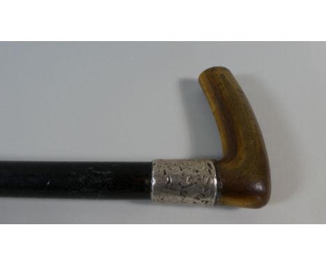 An Ebonised Horn Handled Walking Stick with White Metal Mount, 82cm Long