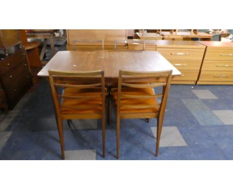 A McKintosh Extending Table and Four Ladder Back Chairs