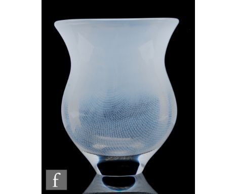 Sven Palmqvist - Orrefors - A post war Kraka glass vase of waisted form cased in clear crystal over an opal ground decorated 