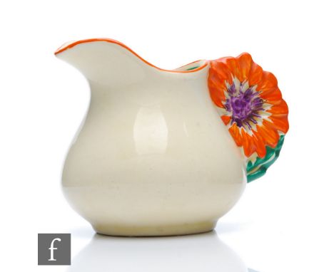 Clarice Cliff - Marguerite - A small cream or milk jug circa 1934, of swollen ovoid form with a relief moulded floral handle 
