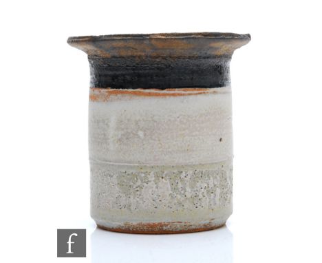 Robin Welch -&nbsp;A contemporary studio pottery vase of cylindrical form, with a flat rim with a rough textured ground decor