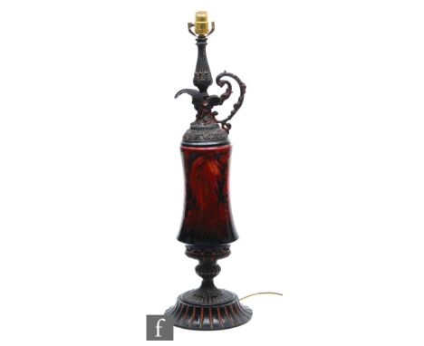 William Moorcroft - A large lamp base formed as a pedestal ewer, the central waisted body in the Flambe Leaf and Berry patter