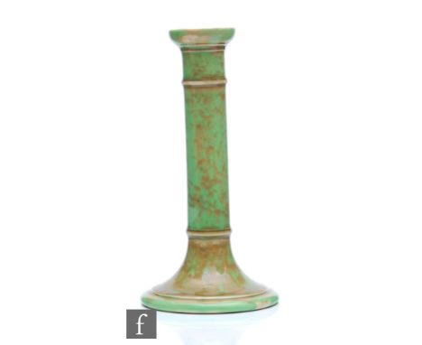 William Moorcroft - A candlestick decorated in a mottled green and brown glaze, possibly a glaze trial,&nbsp;Moorcroft Museum