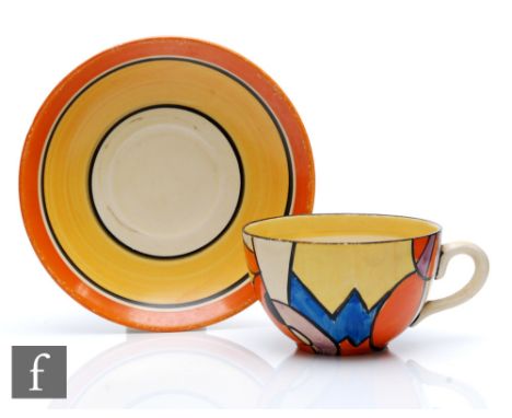 Clarice Cliff - Blue W - A globe shape tea cup and saucer hand painted in an abstract design with large W motif with orange, 