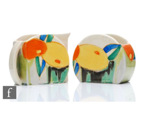 Clarice Cliff - Delecia Citrus - A Stamford shape milk and sugar circa 1932, hand painted with stylised fruit and foliage abo