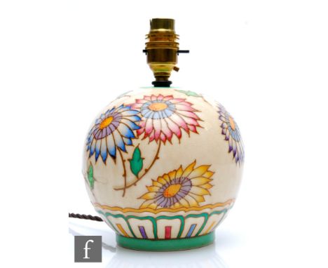 Charlotte Rhead - Bursley Ware - A 1930s Art Deco lamp base of globular form decorated in the TL37 pattern with tubed flowers