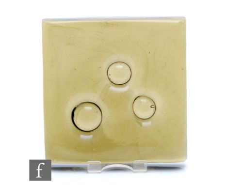 Geoffrey Baxter - Whitefriars - A post war architectural glass block of square form with three dimpled spots, in cinnamon, wi