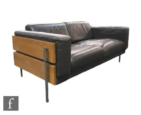 Robin Day - Habitat - A Forum two seat sofa, upholstered in dark chocolate coloured leather, the frame with dovetailed ash pa