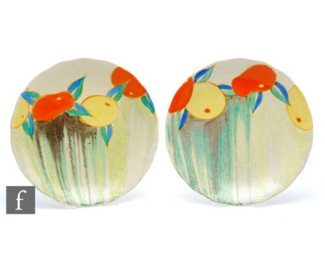 Clarice Cliff - Delecia Citrus - A near pair of wave edge plates circa 1932, hand painted with stylised fruit and foliage ove