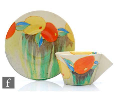 Clarice Cliff - Delecia Citrus - A Conical cup and saucer circa 1933, hand painted with a band of stylised fruit and foliage 