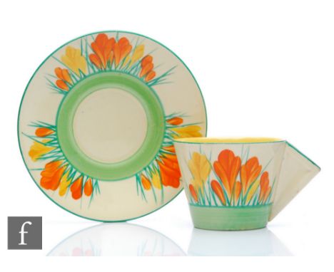 Clarice Cliff - Sungleam - A conical cup and saucer circa 1936, hand painted with Crocus sprays in orange and yellow with yel