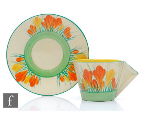 Clarice Cliff - Sungleam - A conical cup and saucer circa 1936, hand painted with Crocus sprays in orange and yellow with yel
