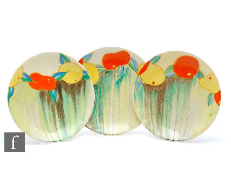 Clarice Cliff - Delecia Citrus - A near pair of wave edge plates circa 1932, hand painted with stylised fruit and foliage ove