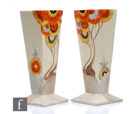 Clarice Cliff - Rhodanthe - A pair of shape 656 square footed vases circa 1934, both hand painted with a stylised tree landsc