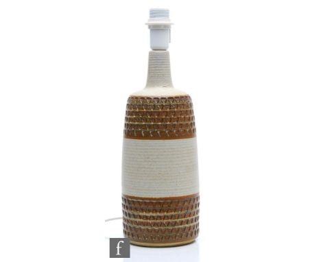 Soholm - A large mid 20th Century lamp base of barrel form with bands of incised triangles glazed in brown against the oatmea