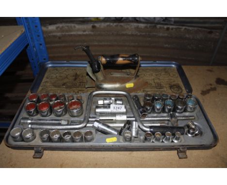 A cased socket set together with a vintage iron