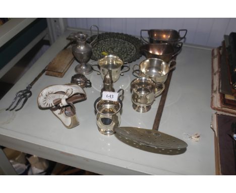 A collection of silver plated teaware; chestnut roaster; butter pats; toasting fork etc.