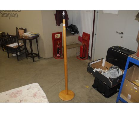 A wooden standard lamp 