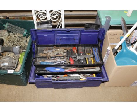 A plastic toolbox and contents of various fittings and tools