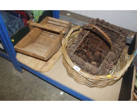 A wooden trug, chopping board and two wicker baskets 